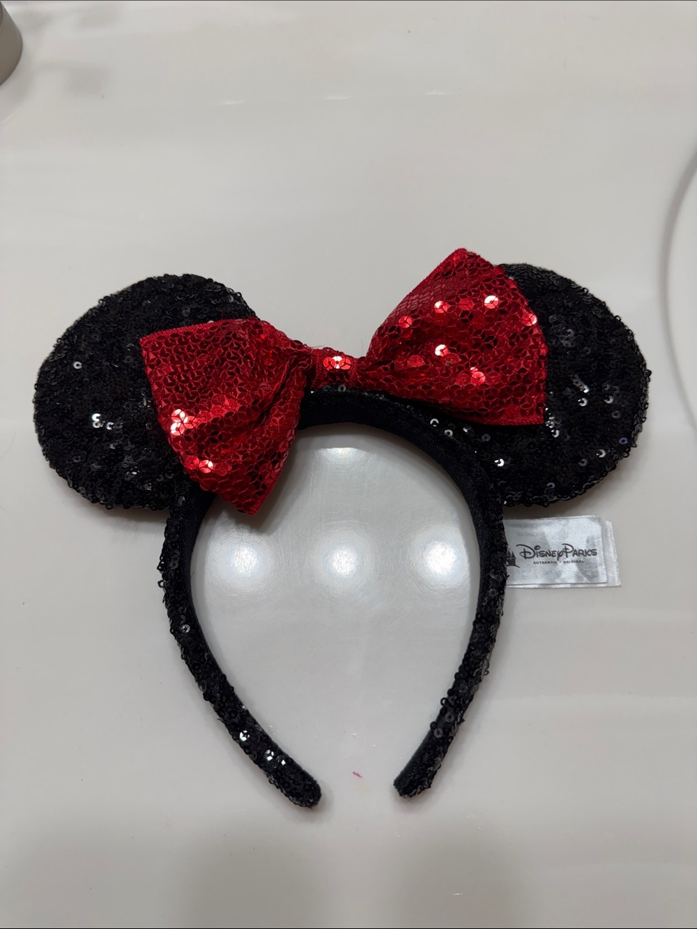 Disney Black Sequin Minnie Ear Headband with Red Bow